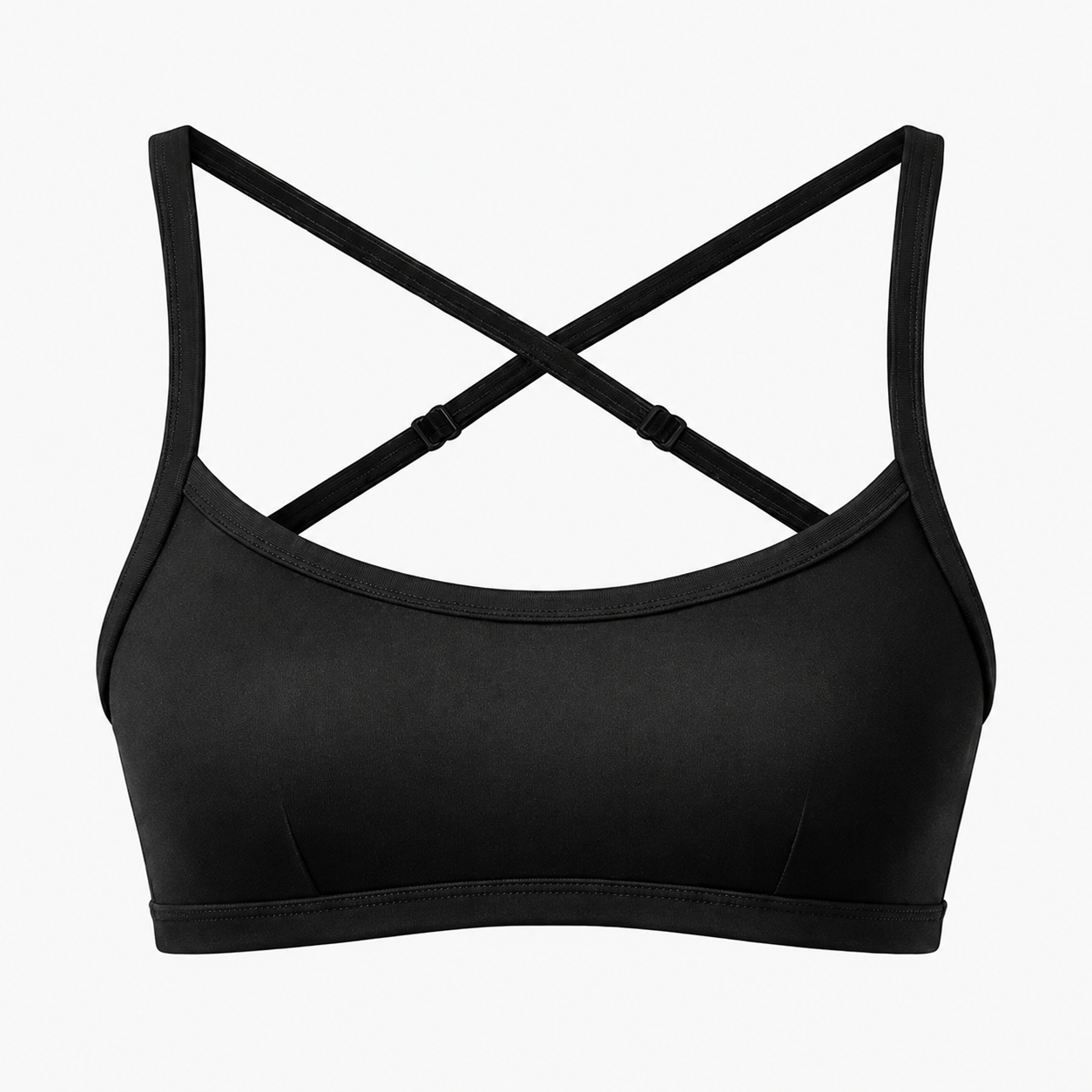 A black sports bra with wide underarm cups and thin crossed shoulder straps, shown against a plain white background.
