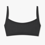 A grey scoop-neck bralette (pole top) with wide shoulder straps, shown flat against a light gray background.